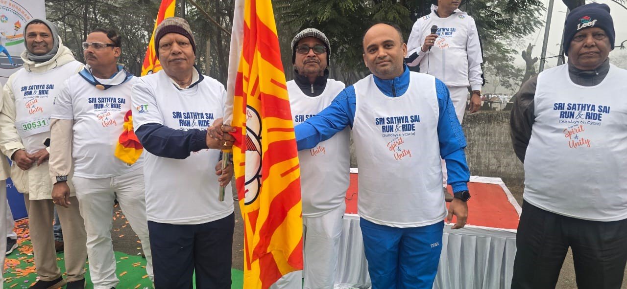Participants running and cycling during Shri Sathya Sai Run and Ride Rourkela at Birsa Munda Athletic Stadium